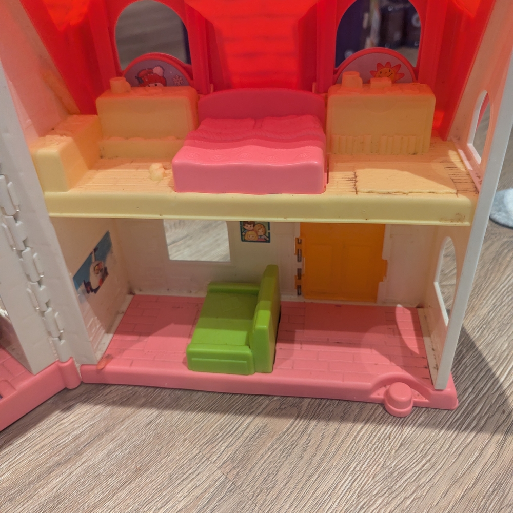 Colorful Dollhouse with Pink and Green Interior